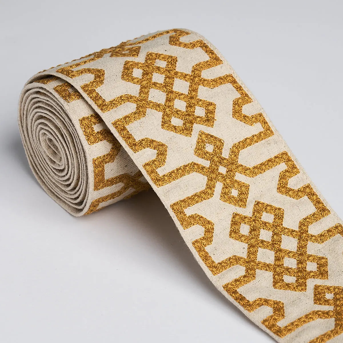 KNOTTED-TRELLIS-TAPE-OCHER-ON-UNBLEACHED-SCHUMACHER-80882